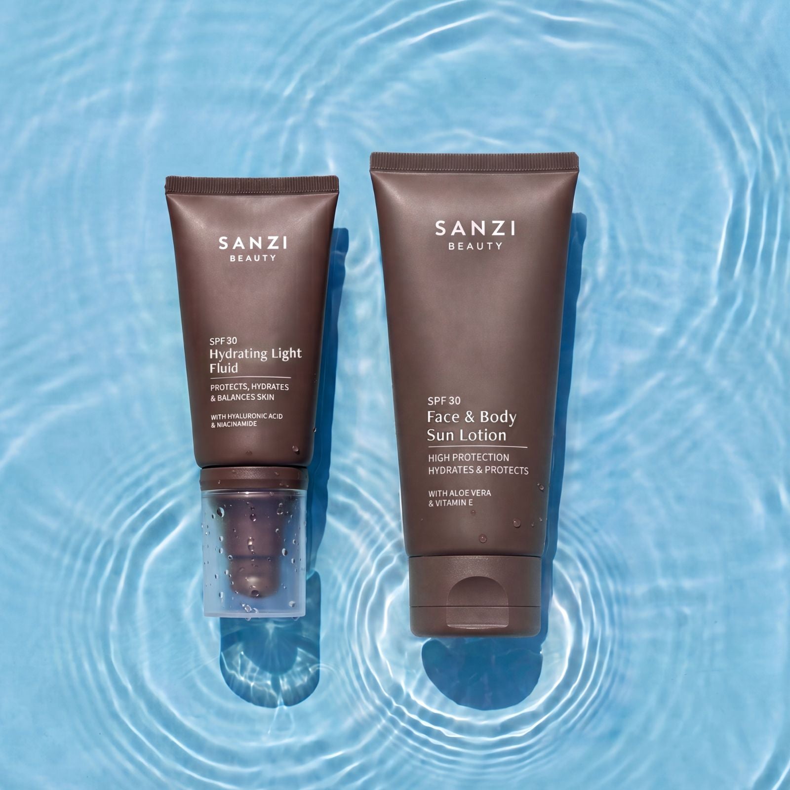 PAKKE: HYDRATING LIGHT FLUID SPF30/50 + FACE & BODY SUN LOTION SPF30/50